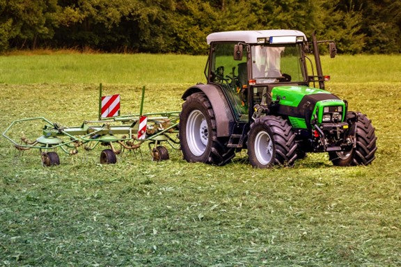 power take off powering implement on a tractor